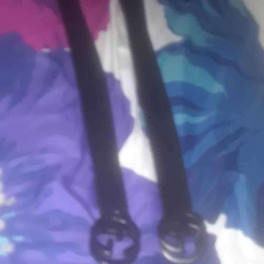 Two black Gucci belts
